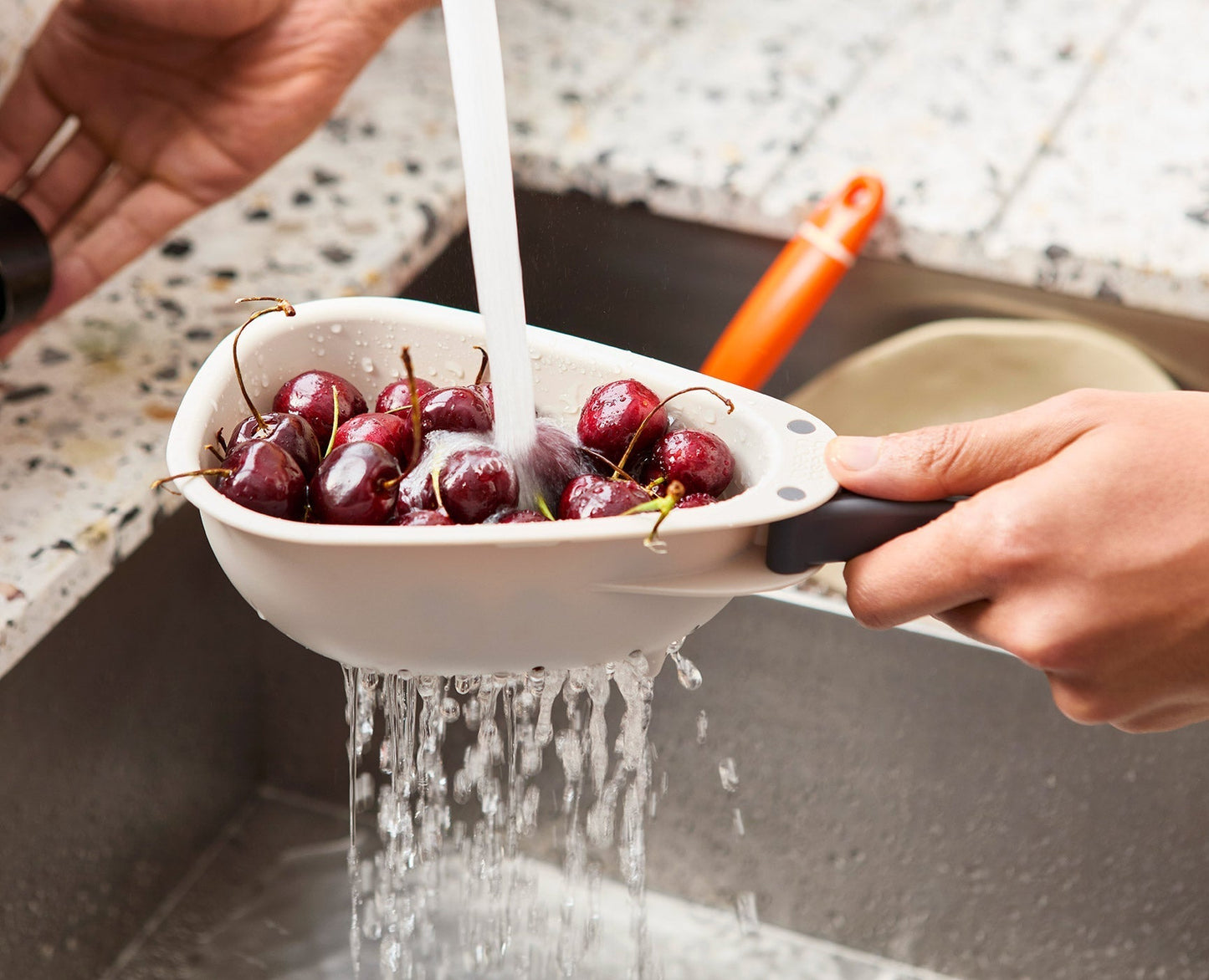[half-width] Droplet Mini White Colander with Folding Handle